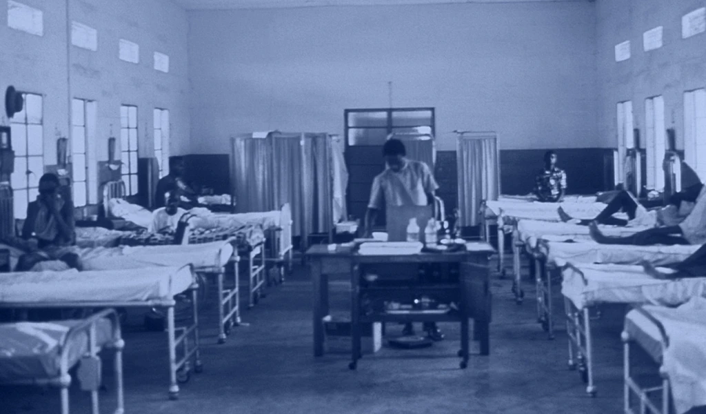 historic image of hopsital ward with lassa patients on beds