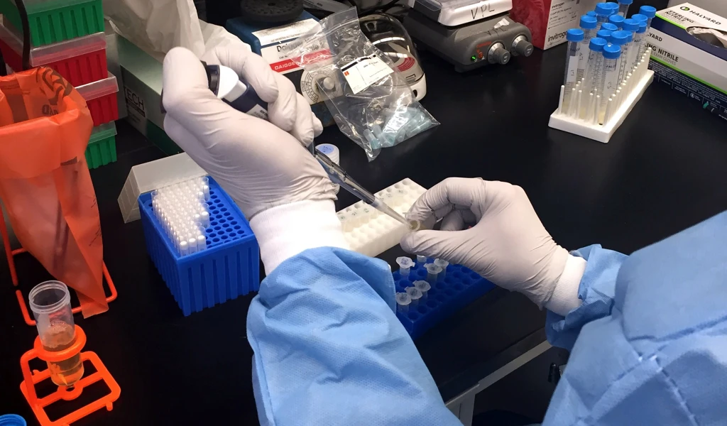 Zika-virus-researcher-at-NIAID-Vaccine-Research_Center-pipets-samples.