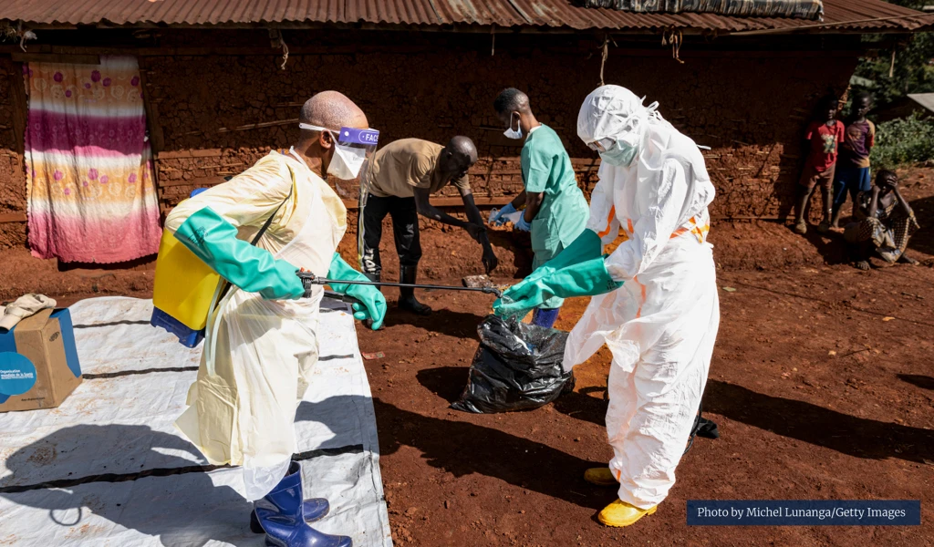 Health workers wearing PPE during Ebola response May 2026 