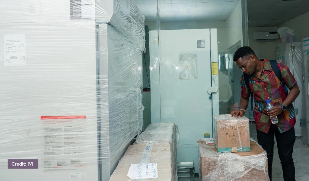 person inspecting packaging equipment