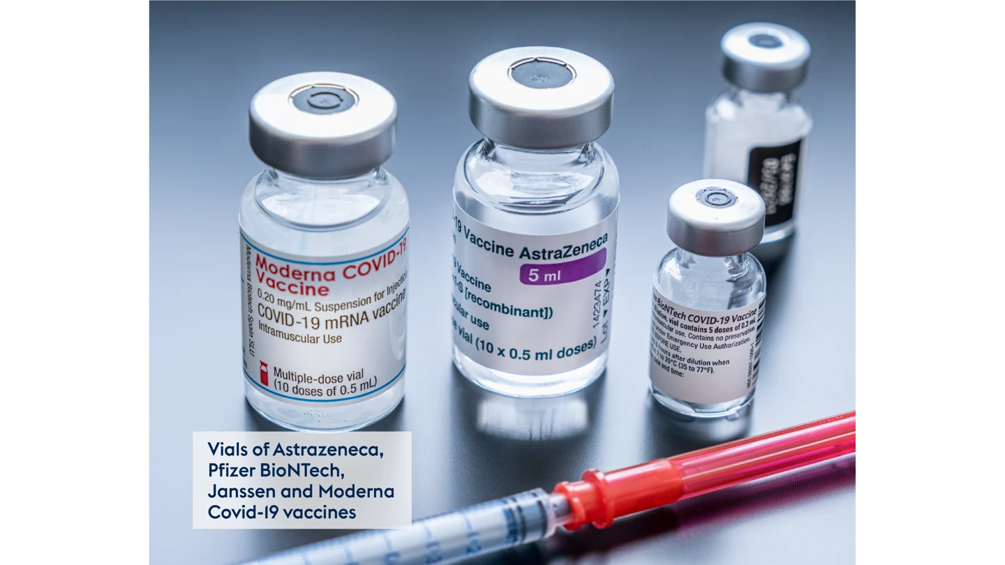 photo of different COVID-19 doses in glass vials