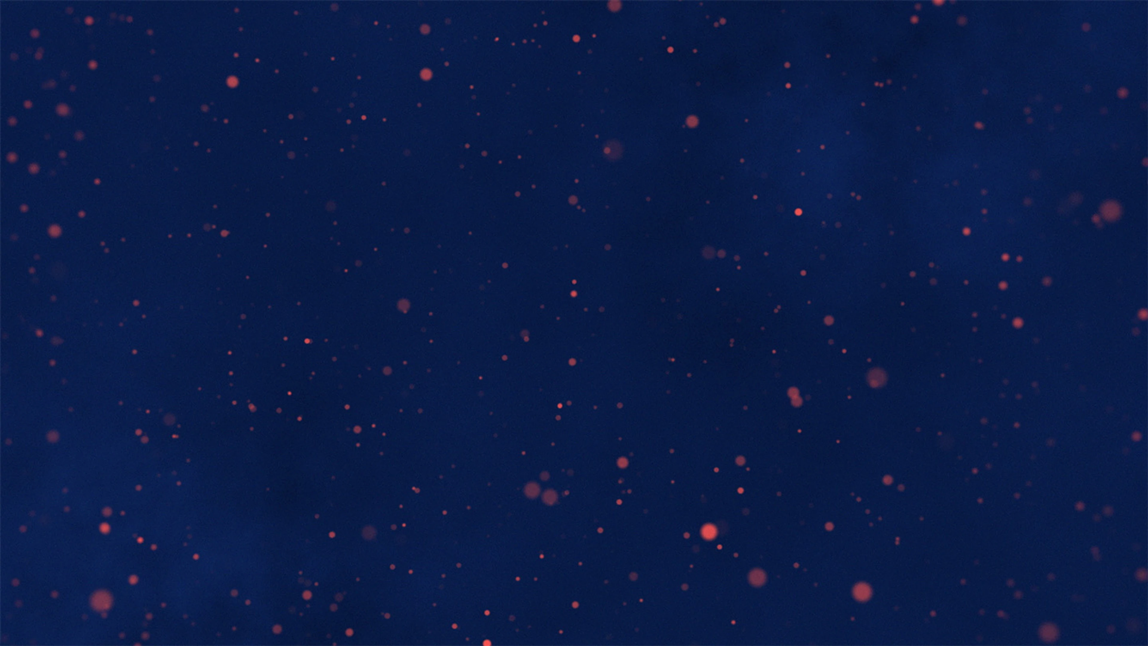 blue background with red particles dotted all over
