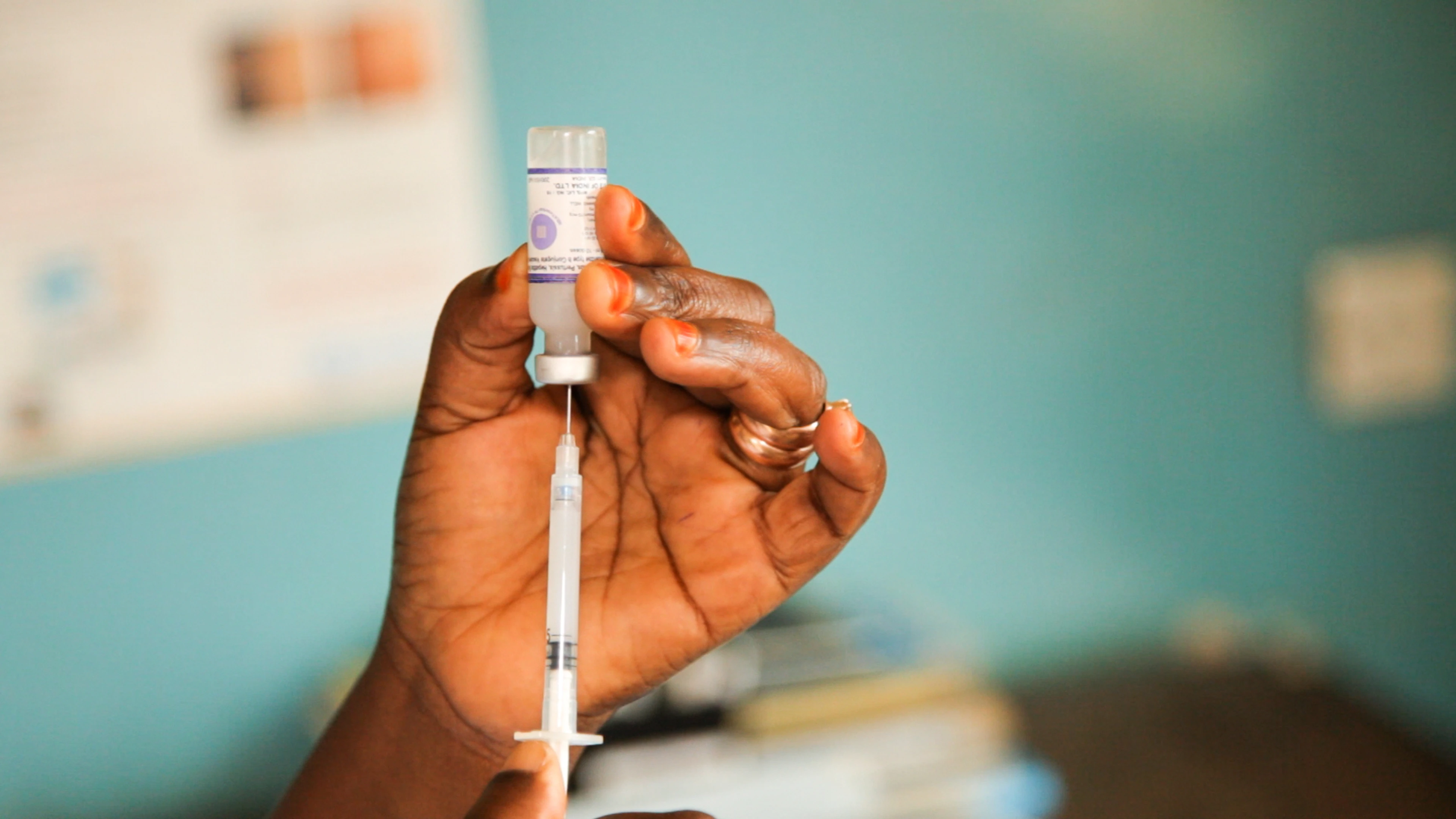 Vaccine vial and syringe