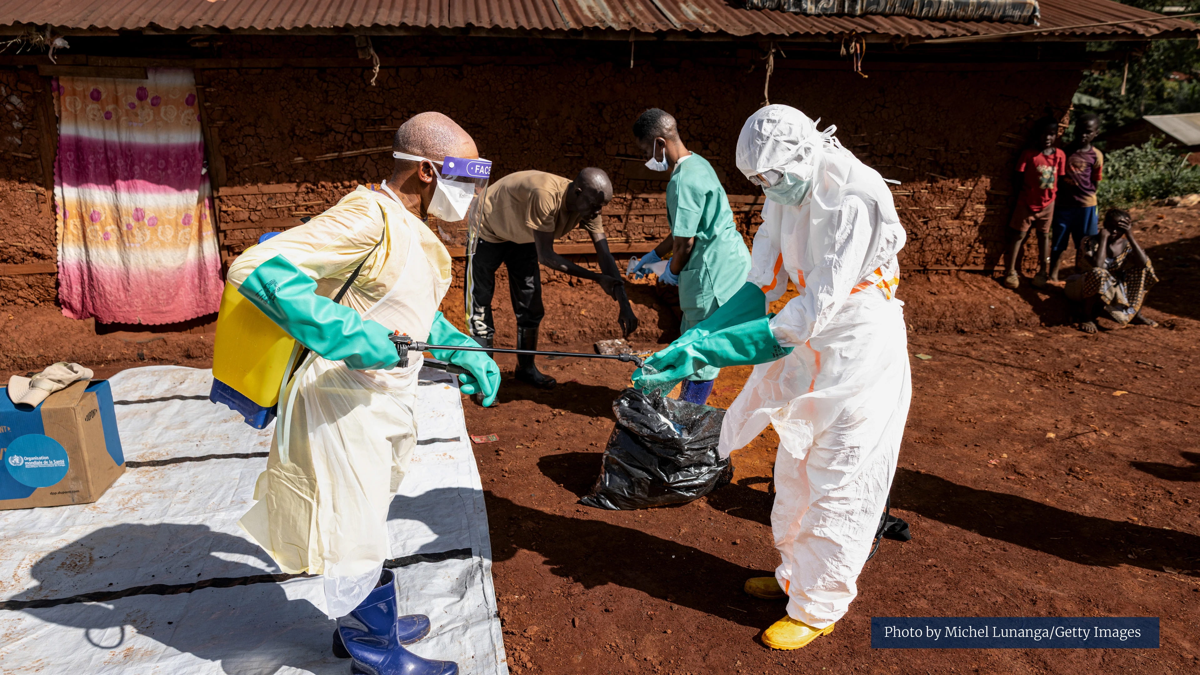 Health workers wearing PPE during Ebola response May 2026 