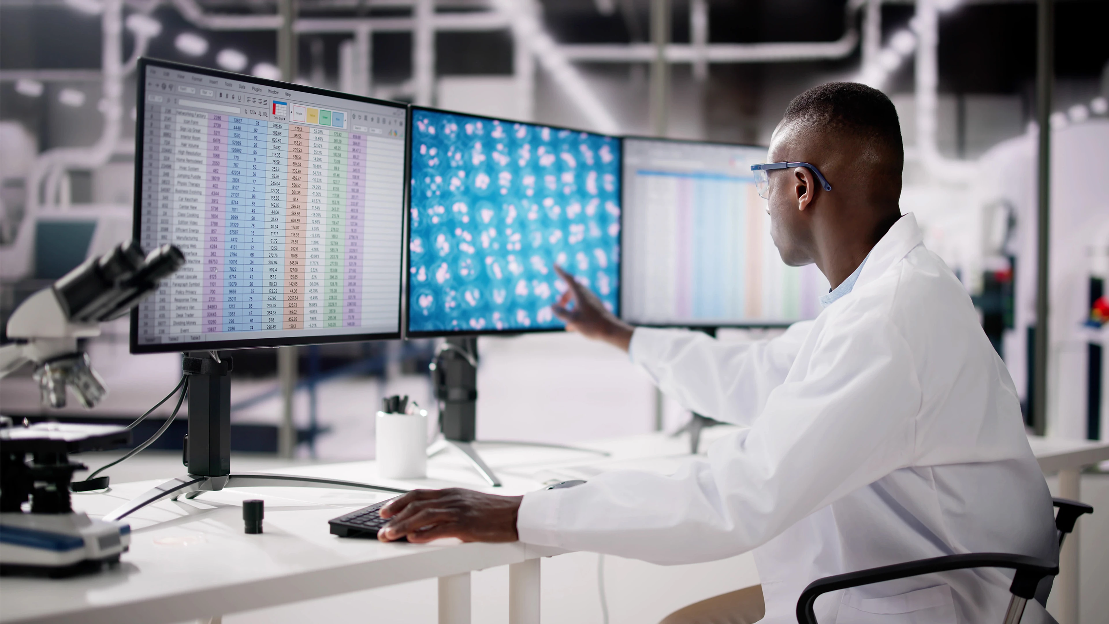 researcher analyzing spreadsheet data in lab setting