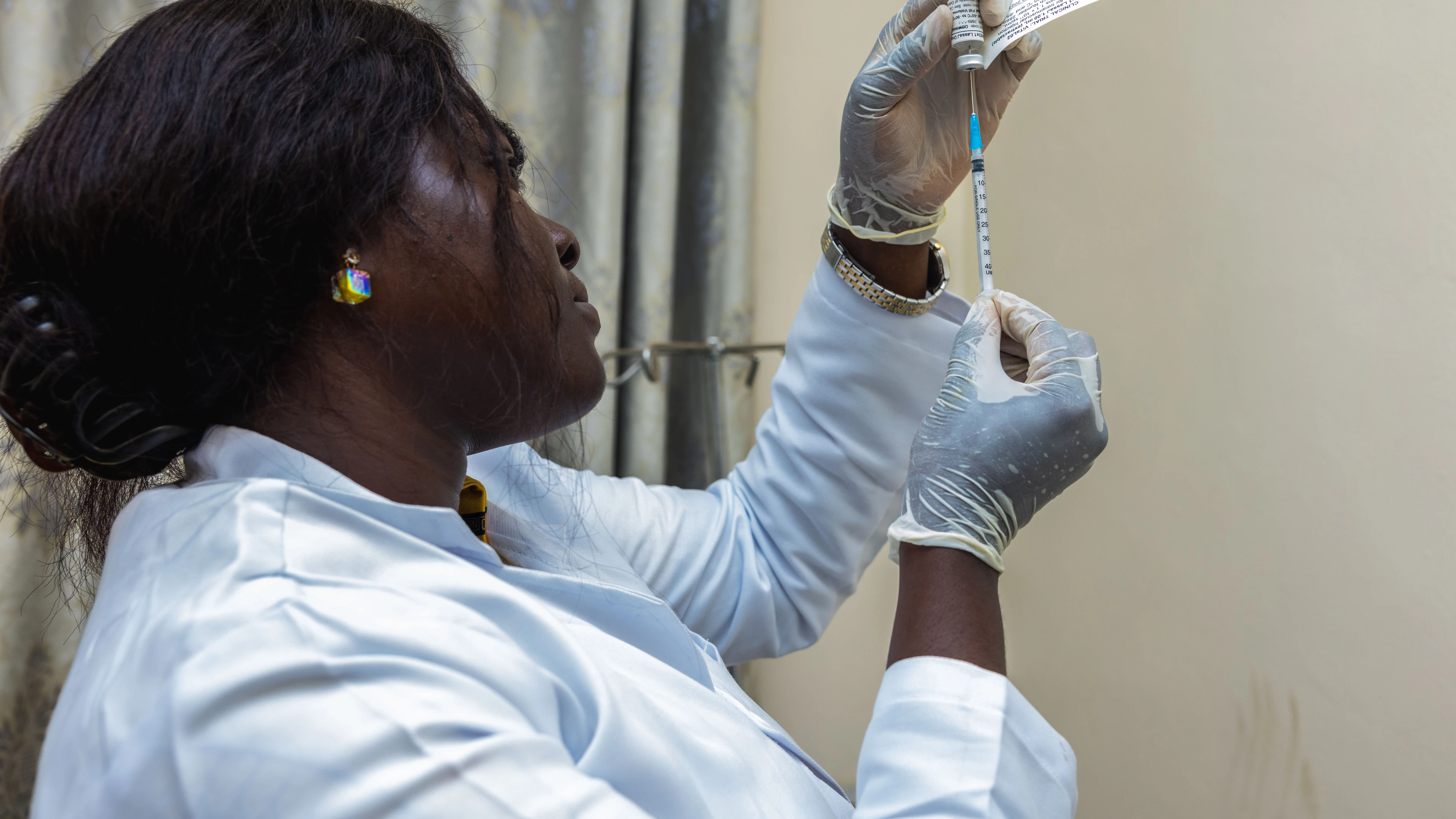 Preparation of vaccine by study pharmacist for Oxford Lassa vaccine trial in Ghana, Credit: Kintampo Health Research Centre